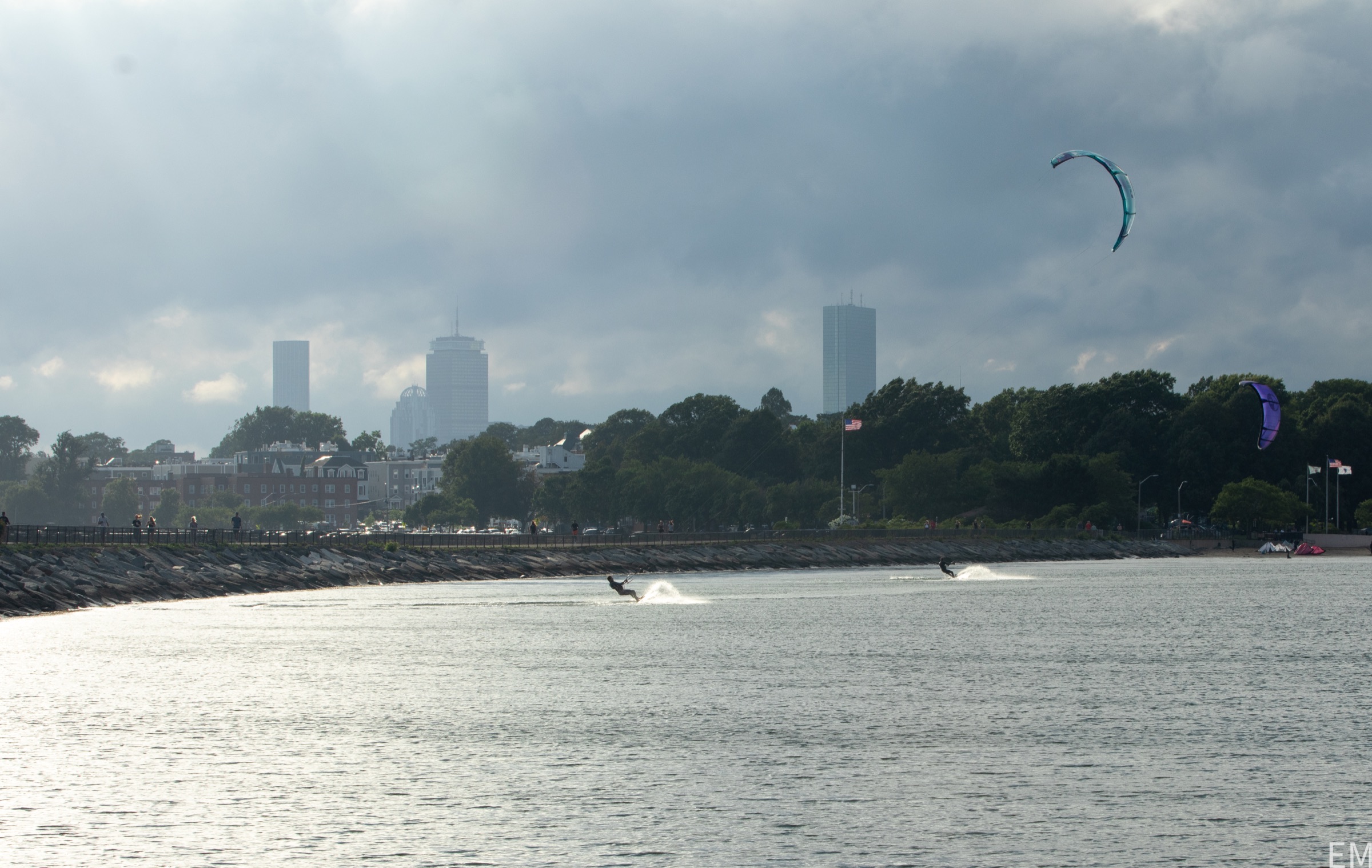 Kiteboarders riding on Boston Harbor near Pleasure Bay